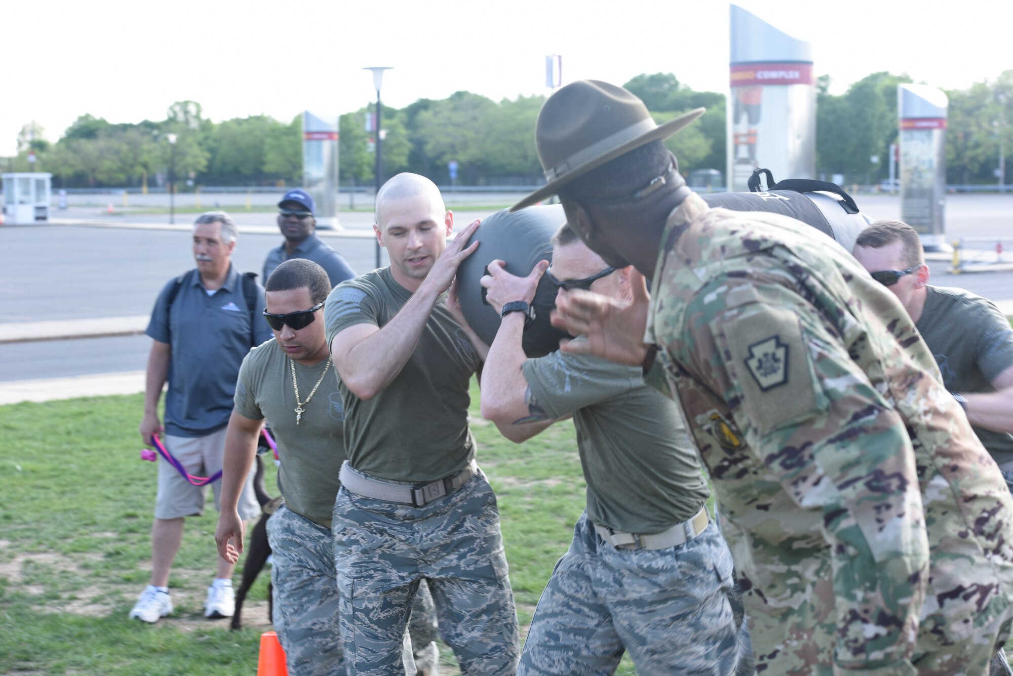 A five-man team from the 193rd Special Operations Security Forces Squadron competes in the inaugural Military and Pit Crew Challenge, in Philadelphia, Pennsylvania, Tuesday, May 8, 2018. The challenge was one of the third annual NASCAR XFINITY Philadelphia Takeover events brought to Philadelphia by Pocono Raceway, Dover International Speedway and Comcast to celebrate the sport in advance of upcoming races near at Pocono and Dover. (U.S. Air Force Photo by Master Sgt. Culeen Shaffer/Released)