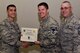 U.S. Air Force Col. Ricky Mills, 17th Training Wing commander, presents Tech. Sgt. Michael Jurich, 315th Training Squadron instructor, their certificate of selection with Chief Master Sgt. Daniel Stein, 17th TRW command chief, during a Master Sergeant release party at the Event Center on Goodfellow Air Force Base, Texas, May 25, 2018. Goodfellow held the party to notify the selected promotees and to give fellow wingmen and friends an opportunity to congratulate them on their success. (U.S. Air Force photo by Senior Airman Randall Moose)