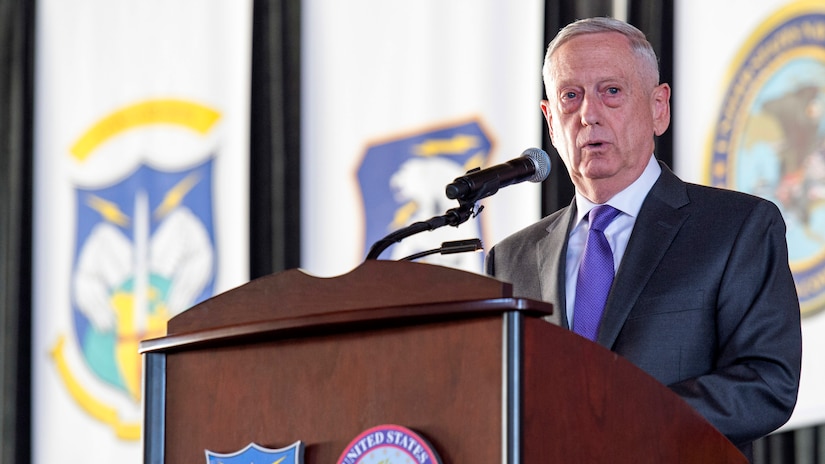 Defense Secretary James N. Mattis provides remarks from behind a podium.