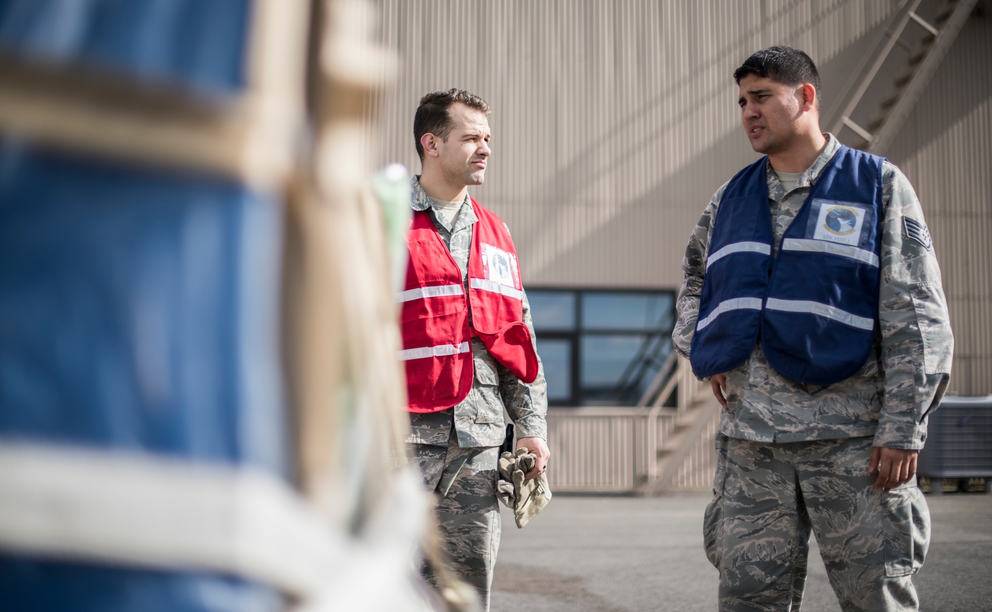 Staff Sgt. Russel Prusinski, 92nd Logistics Readiness Squadron Traffic Management Office, and Staff Sgt. Joseph Needham, 92nd LRS commander’s administrative assistant, discuss a cargo move during an exercise at Fairchild Air Force Base, Washington, May 2, 2018. Team Fairchild practiced their ability to perform during contingency operations, April 30 through May 11, giving personnel the hands-on experience needed to effectively deploy Airmen and assets downrange at a moment’s notice. (U.S. Air Force Photo/Senior Airman Sean Campbell)