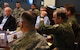 Col. Gregory C. Jones, 301st Fighter Wing commander, gives a briefing to 12 honorary commanders during a wing overview event, May 18, 2018, at Naval Air Station Fort Worth Joint Reserve Base, Texas. The event's goal was to enhance the understanding of the wing's mission and capabilities for those recently inducted into the Honorary Commanders' Program. (U.S. Air Force photo by Tech. Sgt. Charles Taylor)