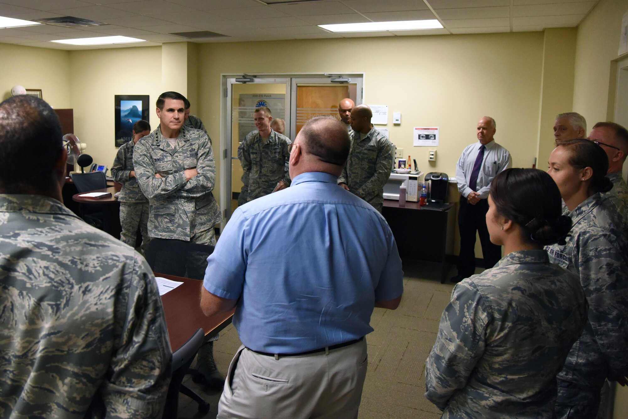U.S. Air Force Lt. Gen. Bradford J. “BJ” Shwedo, Office of the Secretary of the Air Force, Chief Information Dominance and Chief Information Officer, at the Pentagon, Washington, D.C., meets with members at the 85th Engineering Installation Squadron during a tour in Maltby Hall at Keesler Air Force Base, Mississippi, May 22, 2018. In order to become more familiar with Keesler’s training mission, Shwedo also toured squadrons within the 81st Training Group. (U.S. Air Force photo by Kemberly Groue)