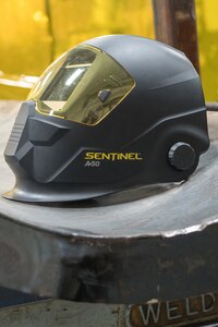 An Airman’s welding helmet waits to be used in the metals fabrication shop on Joint Base Elmendorf-Richardson, Alaska, May 9, 2018. Aircraft Metals Technology Airmen measure broken or worn parts, draw working sketches, make templates, perform precision grinding remove poisonous or corrosive deposits from parts, and write programs for machines using manual and computer-aided manufacturing.