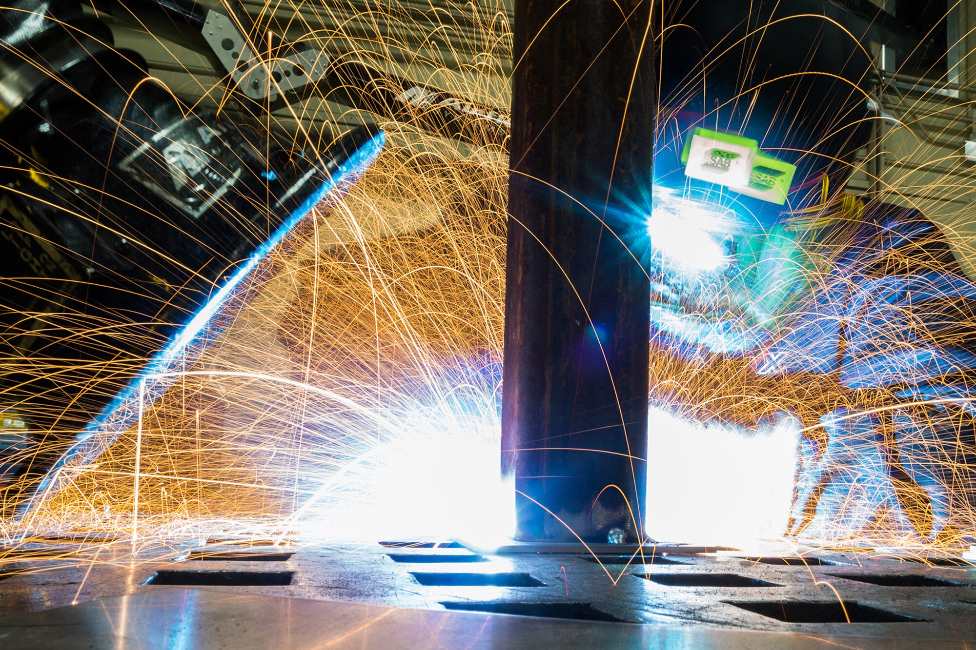 Airman Dalton Sturtz, a native of Seguin, Texas, an aircraft metals technology journeyman assigned to the 3rd Maintenance Squadron, practices welding a metal plate in the metals fabrication shop on Joint Base Elmendorf-Richardson, Alaska, May 9, 2018. Aircraft Metals Technology Airmen measure broken or worn parts, draw working sketches, make templates, perform precision grinding remove poisonous or corrosive deposits from parts, and write programs for machines using manual and computer-aided manufacturing.