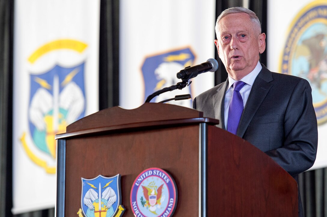 Defense Secretary James N. Mattis provides remarks from behind a podium.