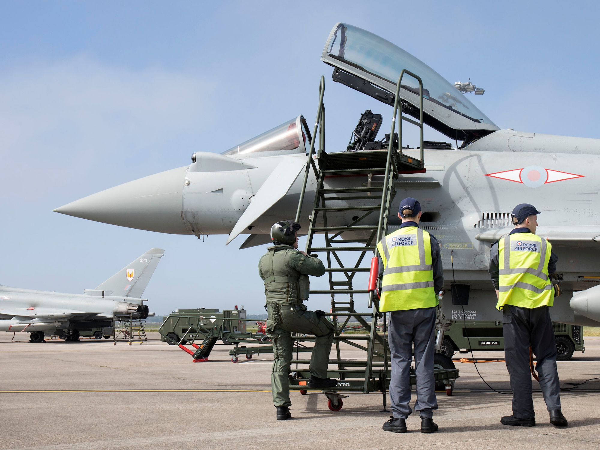 A Royal Air Force Eurofighter Typhoon pilot assigned to the RAF 1 Squadron climbs into his aircraft at RAF Lossiemouth, Scotland, in support of Exercise POINTBLANK May 24, 2018. The objective is to prepare Coalition warfighters for a highly contested fight against near-peer adversaries by providing a multi-dimensional battle-space to conduct advanced training in support of U.S. and U.K. national interests. (Courtesy photo/ Crown Copyright)