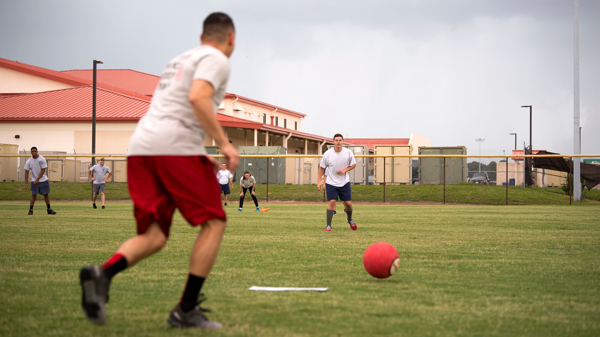 A member of the 6th Security Forces Squadron prepares to kick a ball during a Battle of the Badges kickball game against the fire department at MacDill Air Force Base, Fla., May 22, 2018. This year’s recognition of Police Week consisted of a variety of events that included a remembrance ceremony, a 24-hour vigilance run and a kickball game.