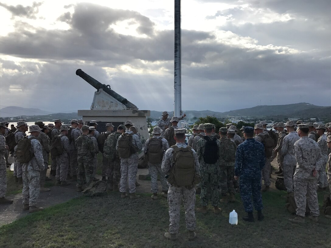 Marines and Sailors of Marine Corps Security Force Company Guantanamo Bay, Cuba conduct a battlefield study of 1st Marine Battalion's assault on Cuzco Well which took place in 1898, May, 17.