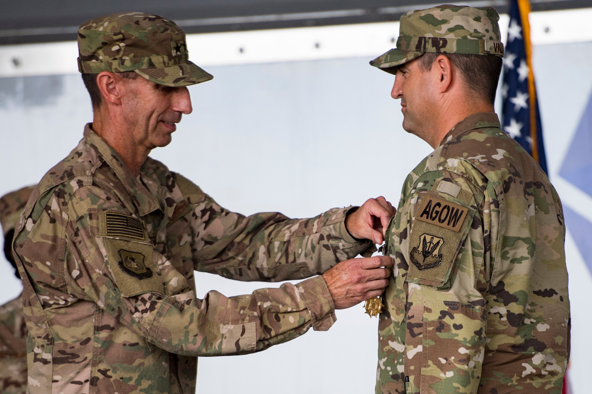 U.S. Air Force Maj. Gen. Scott J.  Zobrist, left, 9th Air Force commander, pins the Legion of Merit on Col. Jeffery Valenzia, 93d Air Ground Operations Wing outgoing commander, during a change of command ceremony, May 23, 2018, at Moody Air Force Base, Ga. After relinquishing command, Valenzia will assume duty as the executive assistant to the North American Aerospace Defense Command U.S. Northern Command commander at Peterson Air Force Base, Colo. (U.S. Air Force photo by Senior Airman Janiqua P. Robinson)