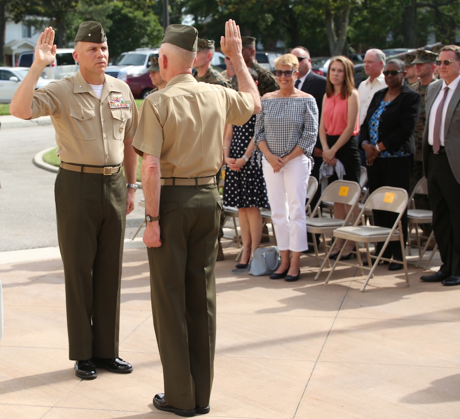 Brig. Gen. Eric. E. Austin, Deputy Commander, U.S. Marine Corps Forces Command, was frocked by Lt. Gen. Mark A. Brilakis, Commander, MARFORCOM, at a promotion ceremony at MARFORCOM headquarters, Naval Support Activity Hampton Roads, Va., May 23. The frocking ceremony, a Naval tradition dating back to 1802, was attended by family, friends and service members from near and far.