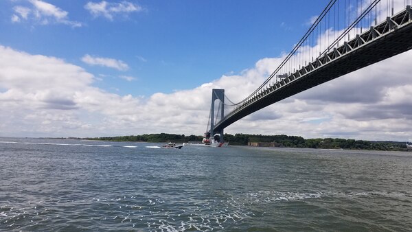 Coast Guard and NYPD vessels transit New York Harbor during Fleet Week 2018