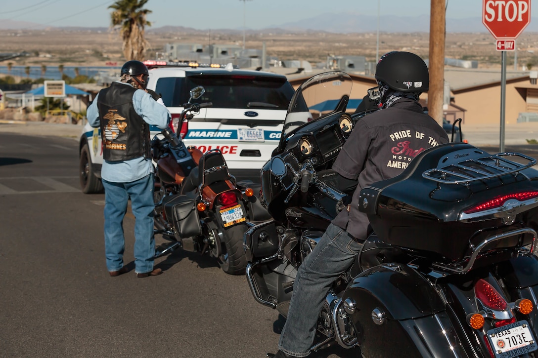 Riders participating in the 4th Annual Ride for Freedom, Freedom to Ride (Sober) Motorcycle Ride begin to suit up in proper safety attire aboard the Marine Corps Air Ground Combat Center, Twentynine Palms, Calif., May 18, 2018. The event is geared toward promoting safe and sober riding. (U.S. Marine Corps photo by Lance Cpl. Rachel K. Porter)