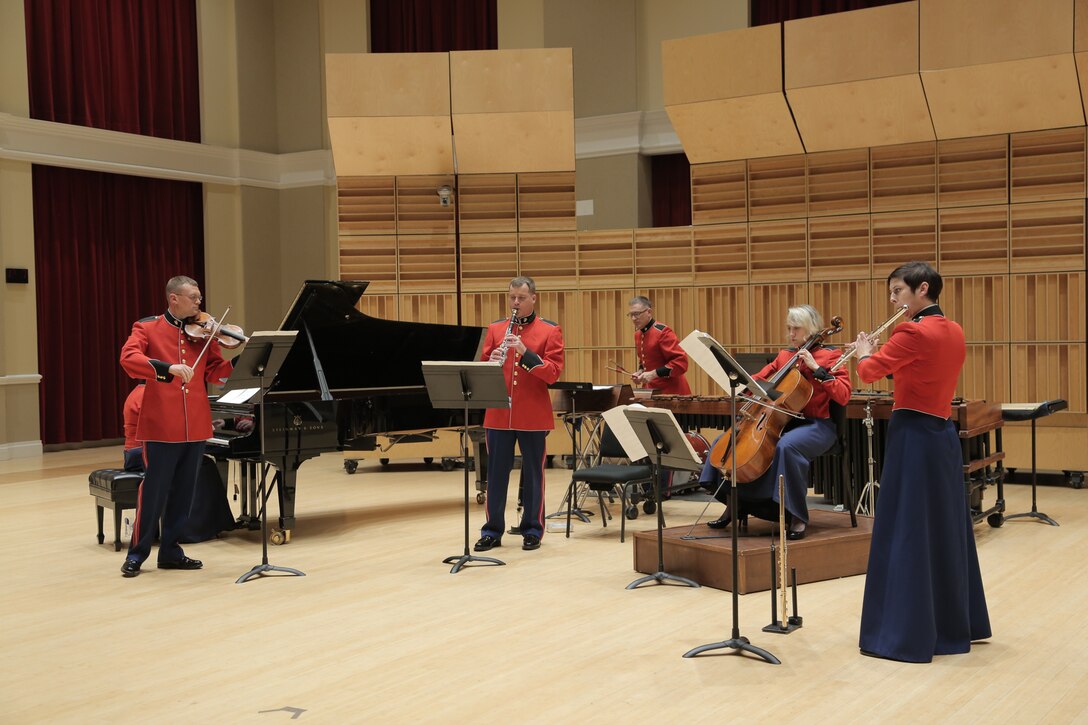 Members of the Marine Band and Marine Chamber Orchestra rehears for the May 6 Chamber Series performance.