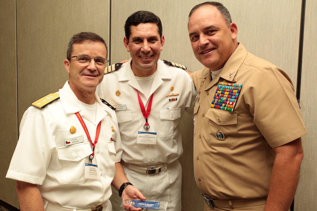 Chilean Marine Corps Rear Adm. Pedro Abrego, left, commanding general, Chilean Marine Corps; Chilean Marine Corps Capt. Alberto Osorio, commander, Amphibious and Naval Transportation; and Columbian Marines Brig Gen. Ricardo Vargas Cuellar, pose for a photo during the Pacific Amphibious Leaders Symposium (PALS) in Honolulu, Hawaii, May 23, 2018. Events such as PALS helps to strengthen our interoperability and working relationships across a wide range of military operations – from humanitarian assistance and disaster relief to complex expeditionary operations. (U.S. Marine Corps photo by Cpl. Maximiliano Rosas)