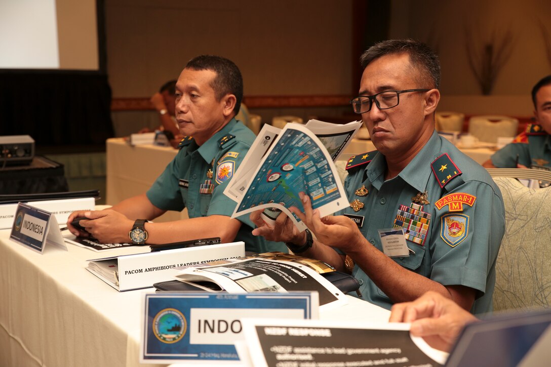 Indonesian Navy First Adm. Rachmad Jayadi, left, commandant, Sea Battle Task Force, Eastern Fleet Command, Indonesian Marine Corps Brig. Gen. Nur Alamsyah, 2nd Marine Force Commander, participate in the Pacific Amphibious Leaders Symposium (PALS) in Honolulu, Hawaii, May 21-24, 2018. PALS brings together senior leaders of allied and partner militaries with significant interest in the security and stability of the Indo-Pacific region to discuss key aspects of maritime/amphibious operations, capability development, crisis response and interoperability. (U.S. Marine Corps photo by Cpl. Maximiliano Rosas)
