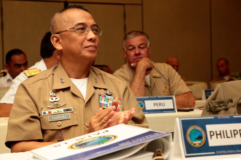 Maj. Gen. Alvin Parreño, commandant of the Philippine Marine Corps claps at the closing of the Pacific Amphibious Leaders Symposium (PALS) in Honolulu, Hawaii, May 24, 2018.