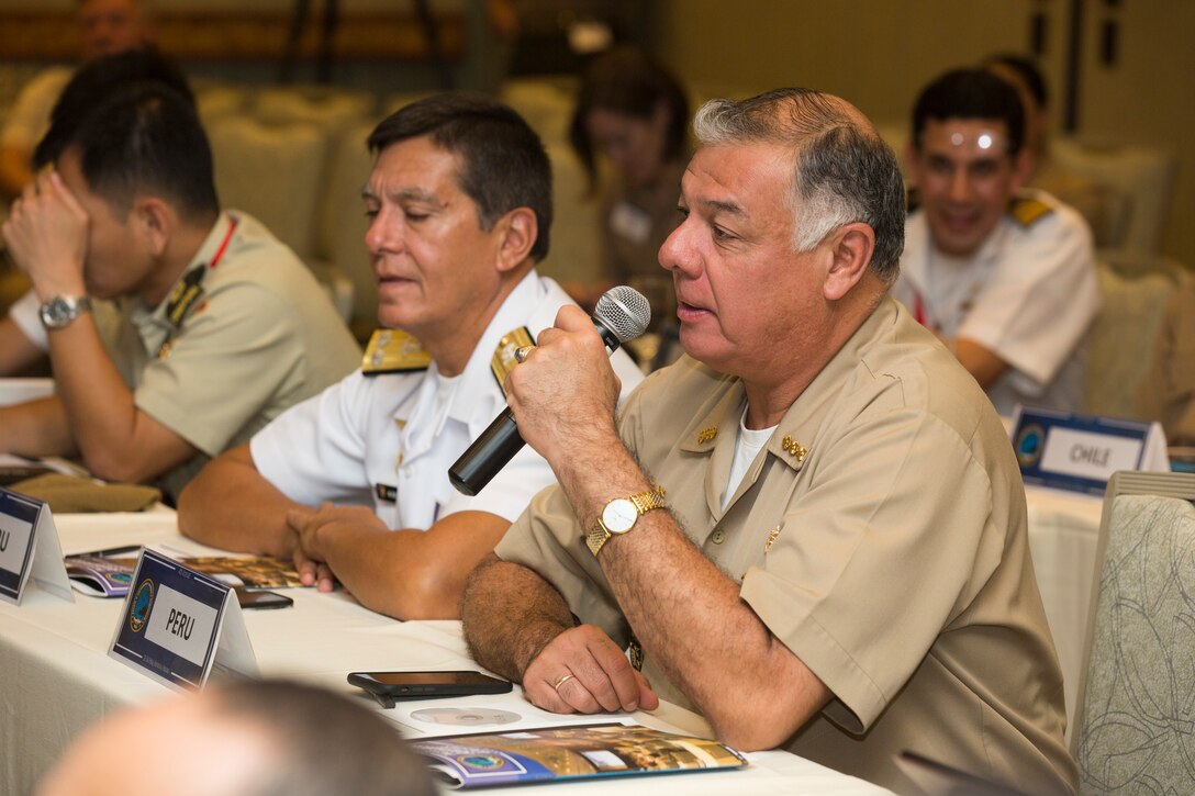 Peruvian Vice Admiral Fernando Cerdan, commander, Pacific Operations General Command, asks a question during the Pacific Amphibious Leaders Symposium (PALS) 2018 in Honolulu, Hawaii, May 24, 2018. PALS brings together senior leaders of allied and partner militaries with significant interest in the security and stability of the Indo-Pacific region to discuss key aspects of maritime/amphibious operations, capability development, crisis response and interoperability. (U.S. Marine Corps photo by Cpl. Patrick Mahoney)