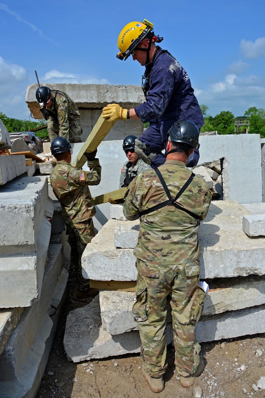 Members of the Utah National Guard Homeland Response Force (HRF) participated in regional disaster training in Missouri, May 14-18, 2018, as part of the New Madrid Seismic Zone (NMSZ) exercise hosted by the Missouri National Guard. The UTNG 116th Engineer Company trained with members of Missouri Task Force One during search and extraction missions, shoring of unstable structures and breaching of structures to reach hypothetical patients.