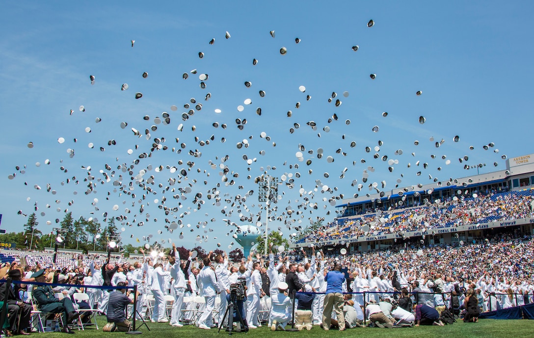 Newly promoted U.S. Marine Corps 2nd Lieutenants and U.S. Navy Ensigns of U.S. Naval Academy Class of 2018 throw their covers in the air during their graduation and commissioning ceremony, Annapolis, Md., May 25, 2018. The Class of 2018 graduated 1,042 midshipmen and were addressed by the Honorable Donald J. Trump, 45th President of the United States.