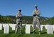 Staff Sgt. Logan Stringham and Airman 1st Class Chase Maurer, 28th Aircraft Maintenance Squadron crew chiefs, pose for Memorial Day weekend at the Black Hills National Cemetery near Sturgis, S.D., May 26, 2018. This is the 11th year Ellsworth has participated in the event. (U.S. Air Force photo by Airman 1st Class Nicolas Z. Erwin)