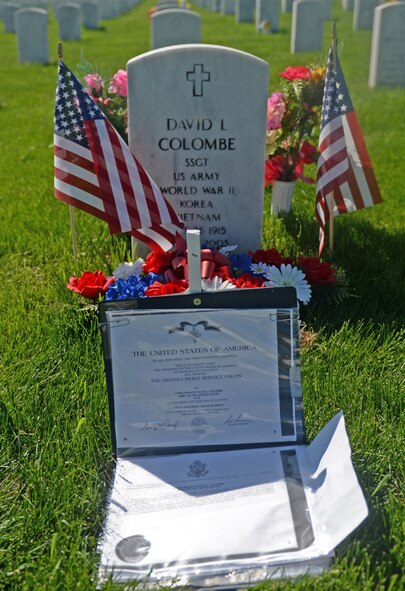 A grave is decorated with different items representing the interned service member’s career for Memorial Day weekend at the Black Hills National Cemetery near Sturgis, S.D., May 26, 2018. Memorial Day is a United States federal holiday observed on the last Monday of May as a day of remembrance for the men and women who died while serving in the U.S. Military. (U.S. Air Force photo by Airman 1st Class Nicolas Z. Erwin)