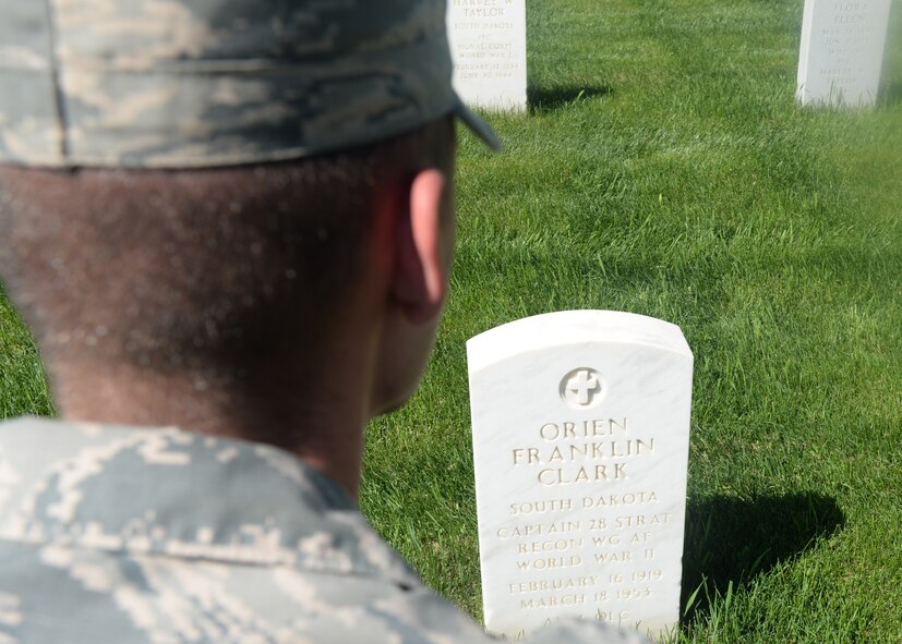 Airman 1st Class Chase Maurer, a 28th Aircraft Maintenance Squadron crew chief, reflects on the sacrifices made by service members for Memorial Day weekend at the Black Hills National Cemetery near Sturgis, S.D., May 26, 2018. Memorial Day’s original purpose was to decorate the graves of service members who died in defense of the United States during the Civil War. (U.S. Air Force photo by Airman 1st Class Nicolas Z. Erwin)