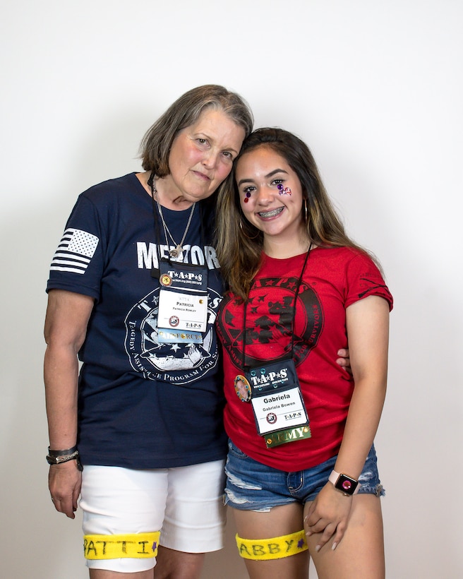 Patti Rowley, mentor, poses with her mentee, Gabby Bowen during the Tragedy Assistance Program for Survivor’s 24th annual National Military Survivor Seminar and Good Grief Camp in Arlington, Virginia.