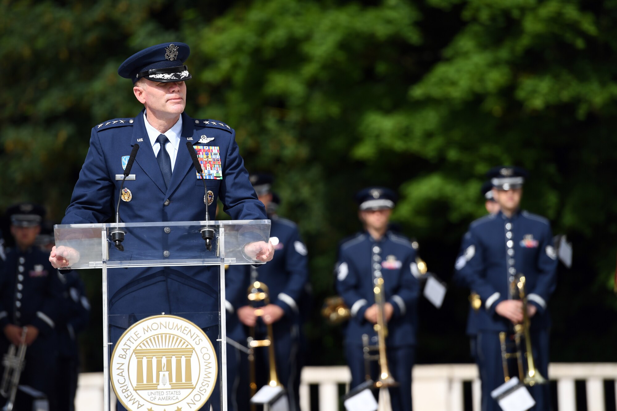 Gen Wolters speaks at a podium during a Memorial Day Ceremony at the Lafayette Escadrille Memorial.