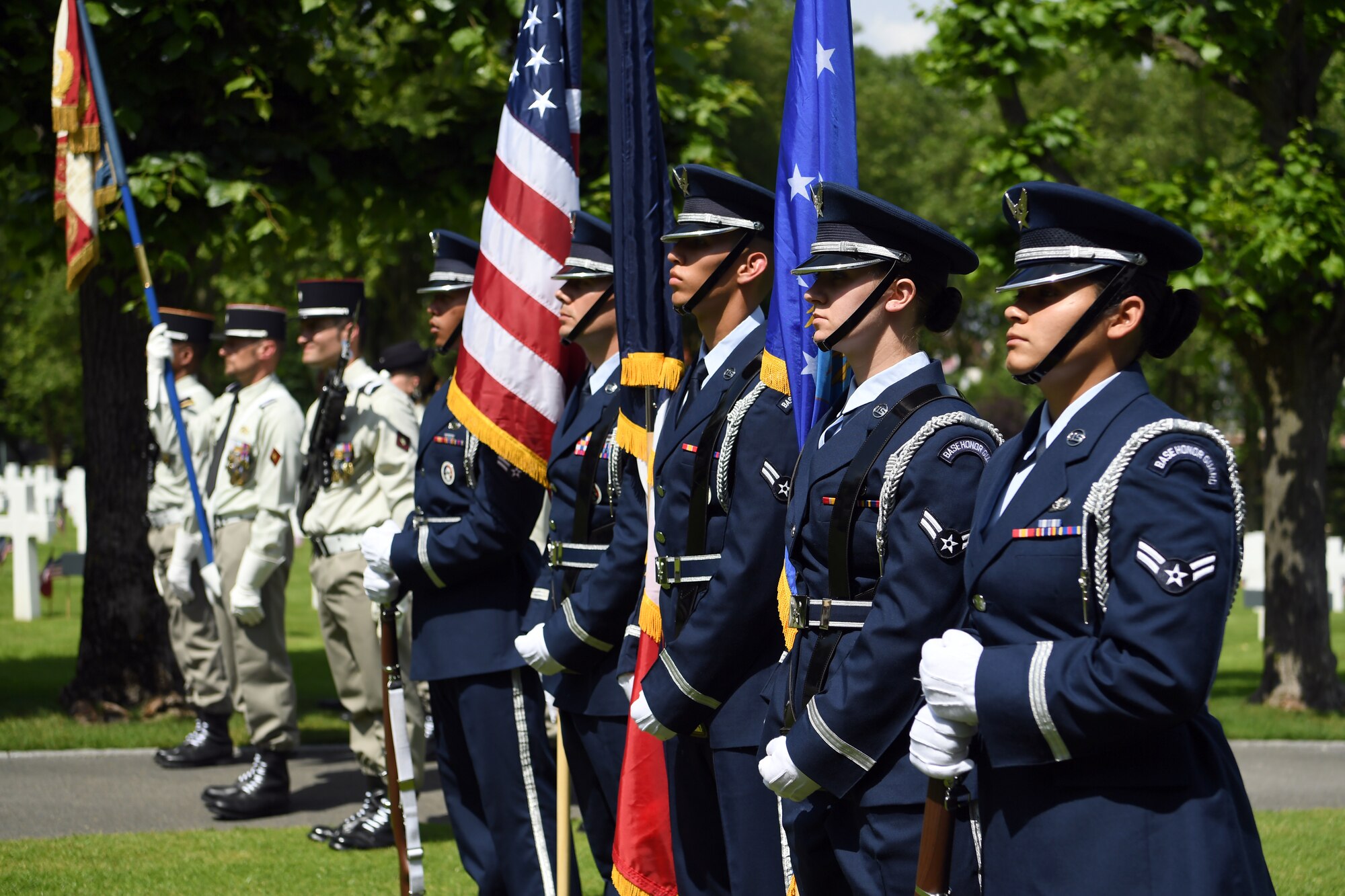 An honor guard detail from Spangdahlem Air Base, Germany, participates in a Memorial Day ceremony alongside their French counterparts at Suresnes American Cemetery and Memorial.