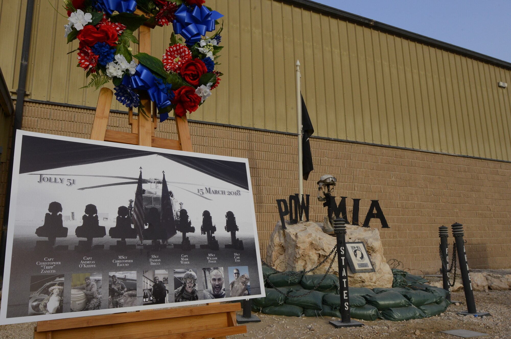 The seven men from Jolly 51 who lost their lives in a HH-60 Pave Hawk helicopter crash were honored during a Memorial Day ceremony at Al Udeid Air Base, Qatar, May 24, 2018. The ceremony also recognized and honored all those who gave the ultimate sacrifice for our freedom. (U.S. Air Force photo by 1st Lt. Katie Spencer)