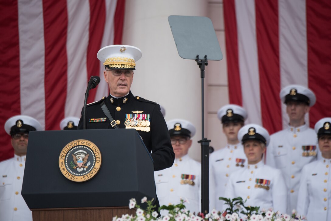 The chairman of the Joint Chiefs of Staff speaks from behind a podium.