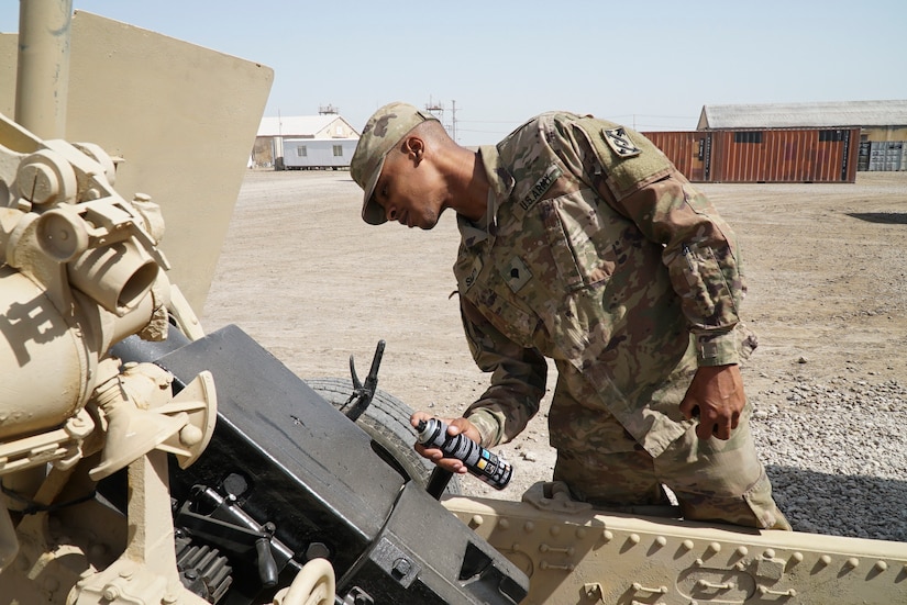 Task Force Grizzly Soldier uses artistic skills for mission success