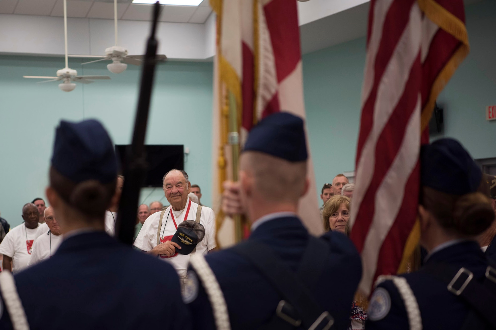 Veterans, current service members, family and friends recite the Pledge of Allegiance as the Colors are presented May 26, 2018 during Honor Flight send off at Wickham Park Senior Center in Melbourne, Fla. 25 veterans, along with their guardians, were able to visit Washington D.C. on this Honor Flight. (U.S. Air Force photo by Airman 1st Class Zoe Thacker)