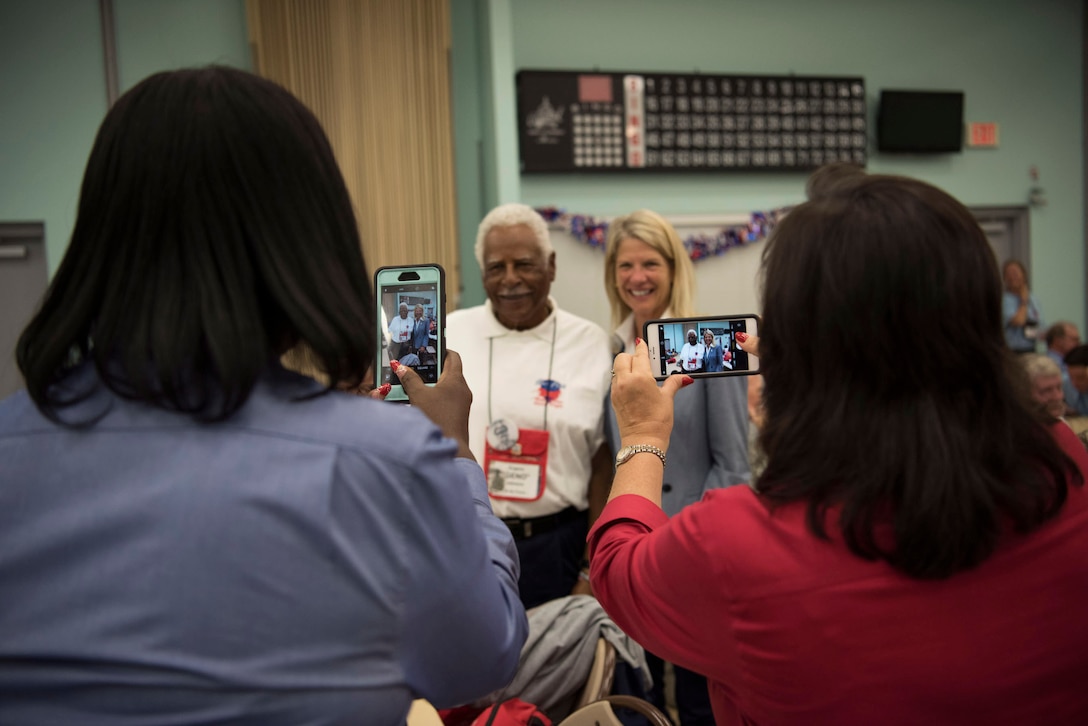 Eugene "Geno" Johnson poses for a photo before he, alongside 24 other veterans, travel to our nation's capitol to visit war memorials, May 26, 2018 at Wickham Park Senior Center in Melbourne, Fla. Johnson retired as a Chief Master Sgt. in the U.S. Air Force and, among many accomplishments, helped found the Defense Equal Opportunity Management Institute (DEOMI) at Patrick Air Force Base.