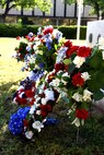 Wreaths in front of the Tom Green County Courthouse Memorial in San Angelo, Texas, at the All Veterans Council of Tom Green County Memorial Day Commemoration May 24, 2018. Members of various veteran associations from the community placed the wreaths as a symbol of remembrance and honor to those who sacrificed their lives in service to the country. (U.S. Air Force photo by Airman 1st Class Seraiah Hines/Released)