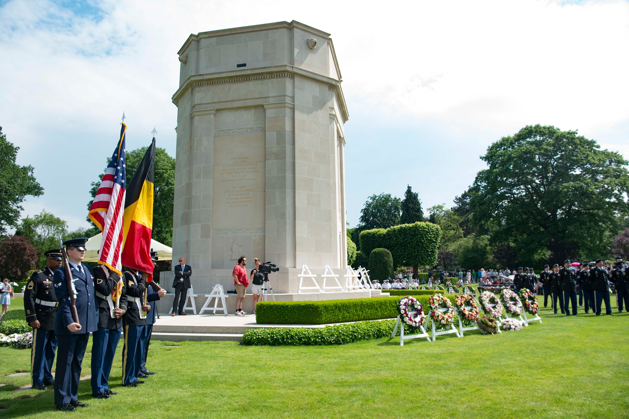 U.S. Soldiers and Airmen stand in honor formation during a Memorial Day ceremony at Flanders Field American Cemetery, Belgium, May 27, 2018.  At Flanders Field accounts for 368 grave sites and memorializes 43 missing in action, most of whom gave their lives in liberating Belgian soil in World War I. (U.S. Air Force photo by Senior Airman Elizabeth Baker)