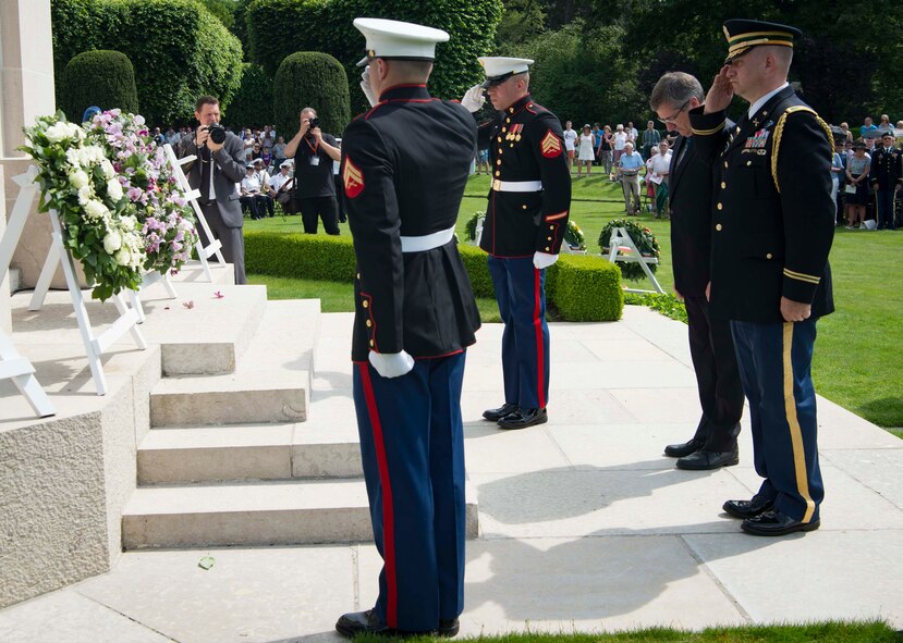 U.S. military and Steven Vandeput, center right, Belgian Minister of Defense, pay respects after laying a wreath in honor of the fallen during a Memorial Day ceremony at Flanders Field American Cemetery, Belgium, May 27, 2018. Military and civilian representatives attended the ceremony, including Brig. Gen. Dieter E. Bareihs, Headquarters U.S. Air Forces in Europe and Africa director of plans, programs and analyses, and a representative of the King of Belgium. (U.S. Air Force photo by Senior Airman Elizabeth Baker)