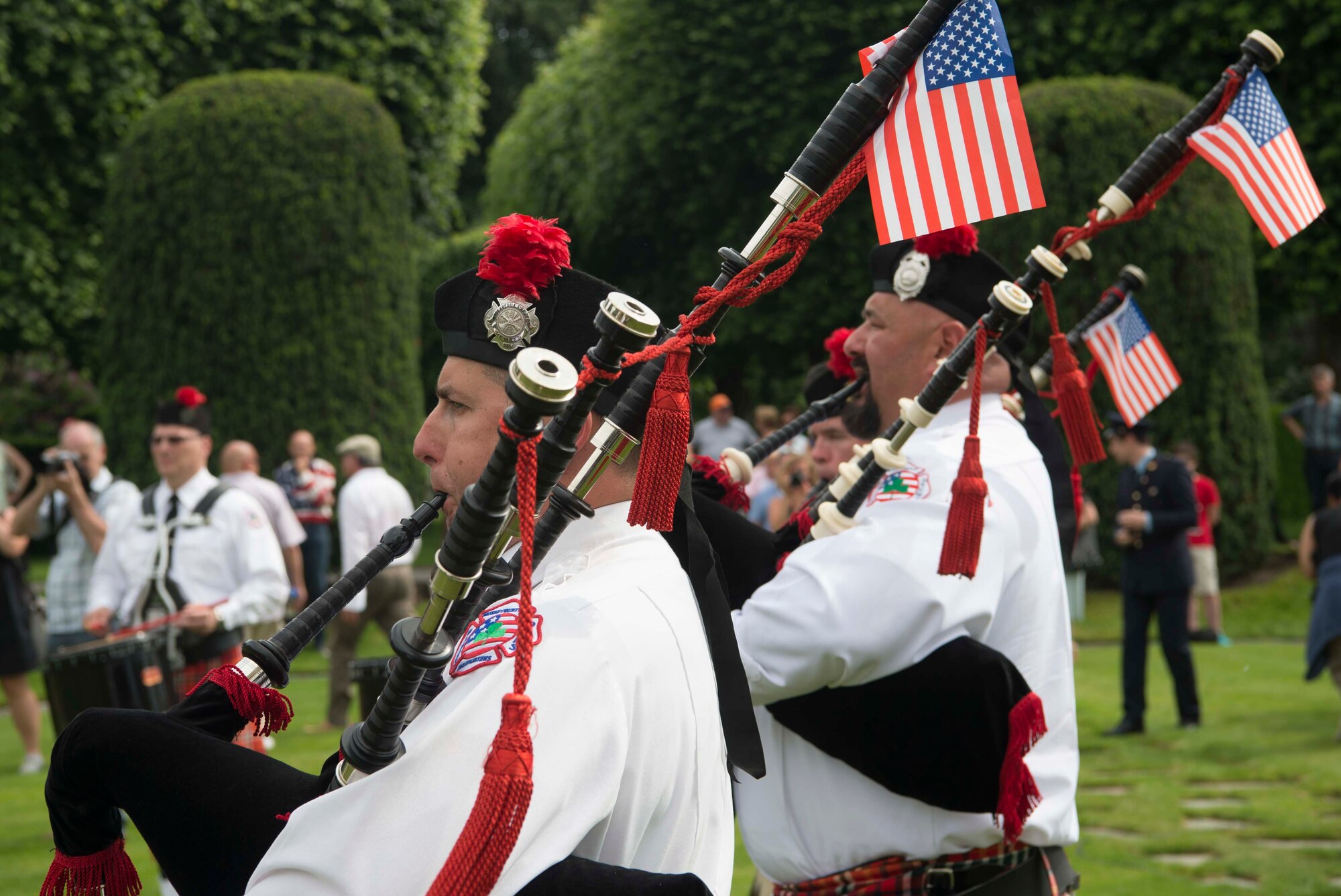 Nassau County firefighters from New York perform during a Memorial Day ceremony at Flanders Field American Cemetery, Belgium, May 27, 2018. This year marks the 100th anniversary since the end of World War I, Nov. 11, 1918. (U.S. Air Force photo by Senior Airman Elizabeth Baker)