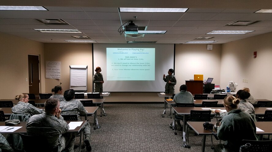 Capt. Andrea Krunnfusz (left) and Capt. Milagros Gargurevich (right), teaching a Playing Big session at the Airman and Family Readiness Center.