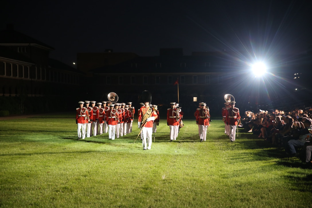 Marines with “The President’s Own” U.S. Marine Band march across the parade deck during a Friday Evening Parade at Marine Barracks Washington D.C., May 25, 2018. The guests of honor for the parade were Gold Star Families and the hosting official was Lieutenant Gen. Robert S Walsh, commanding general, Marine Corps Combat Development Command, and deputy commandant, Combat Development at Integration. (Official photo by Marine Corps Pfc. James Bourgeois/Released)