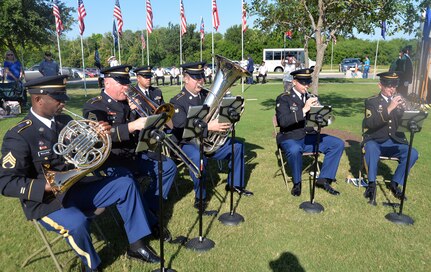 Members of the 323rd Army Band “Fort Sam’s Own” play patriotic songs during the Memorial Day ceremony at the Fort Sam Houston National Cemetery May 28.