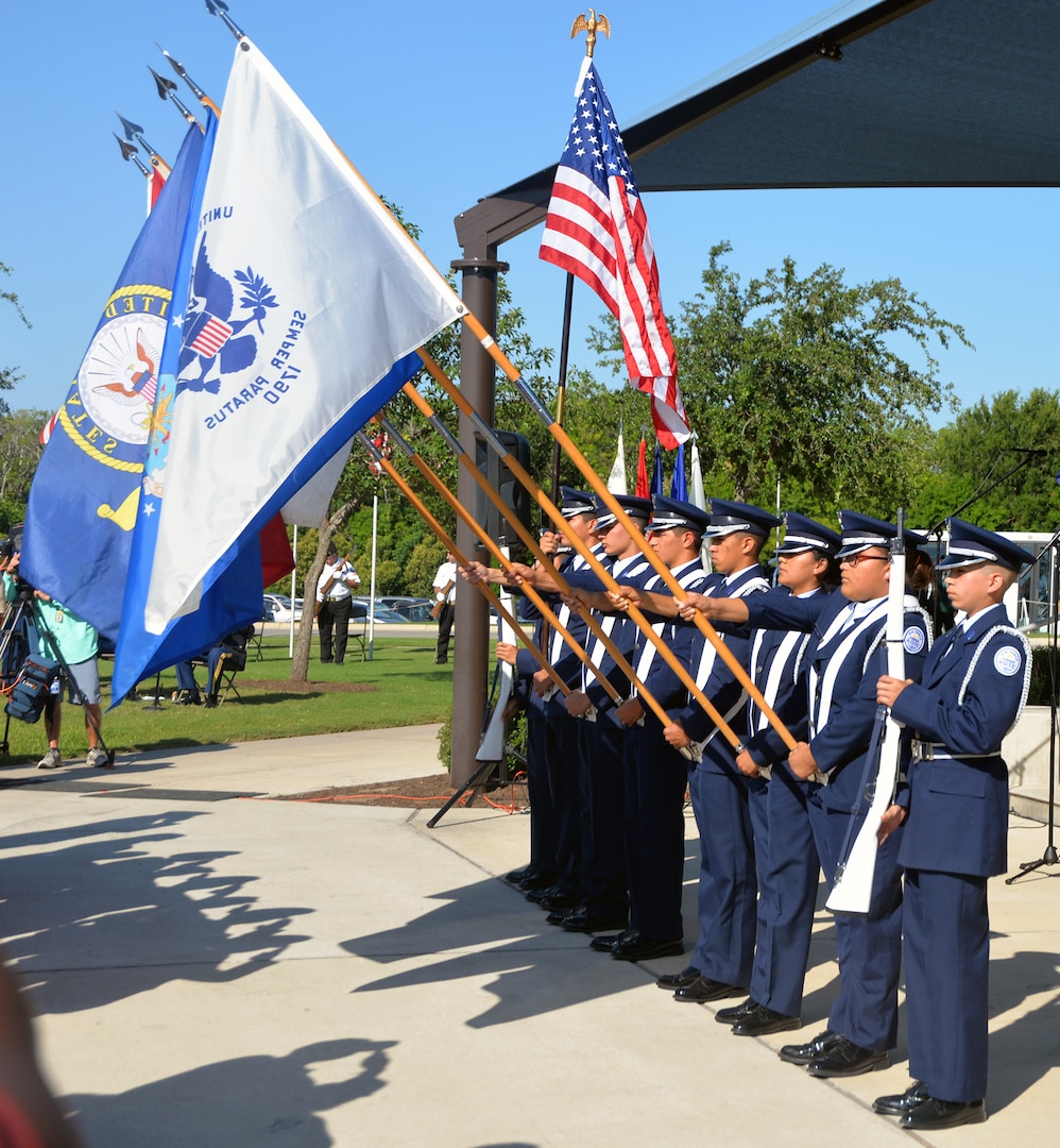 Members of the Southside High Scholl Air Force Junior ROTC present the colors during the Memorial Day ceremony at the Fort Sam Houston National Cemetery May 28.