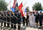 Members of the Southside High School Junior Air Force ROTC Honor Guard present the colors as local military leaders salute during the Memorial Day ceremony at the Fort Sam Houston National Cemetery amphitheater May 28.