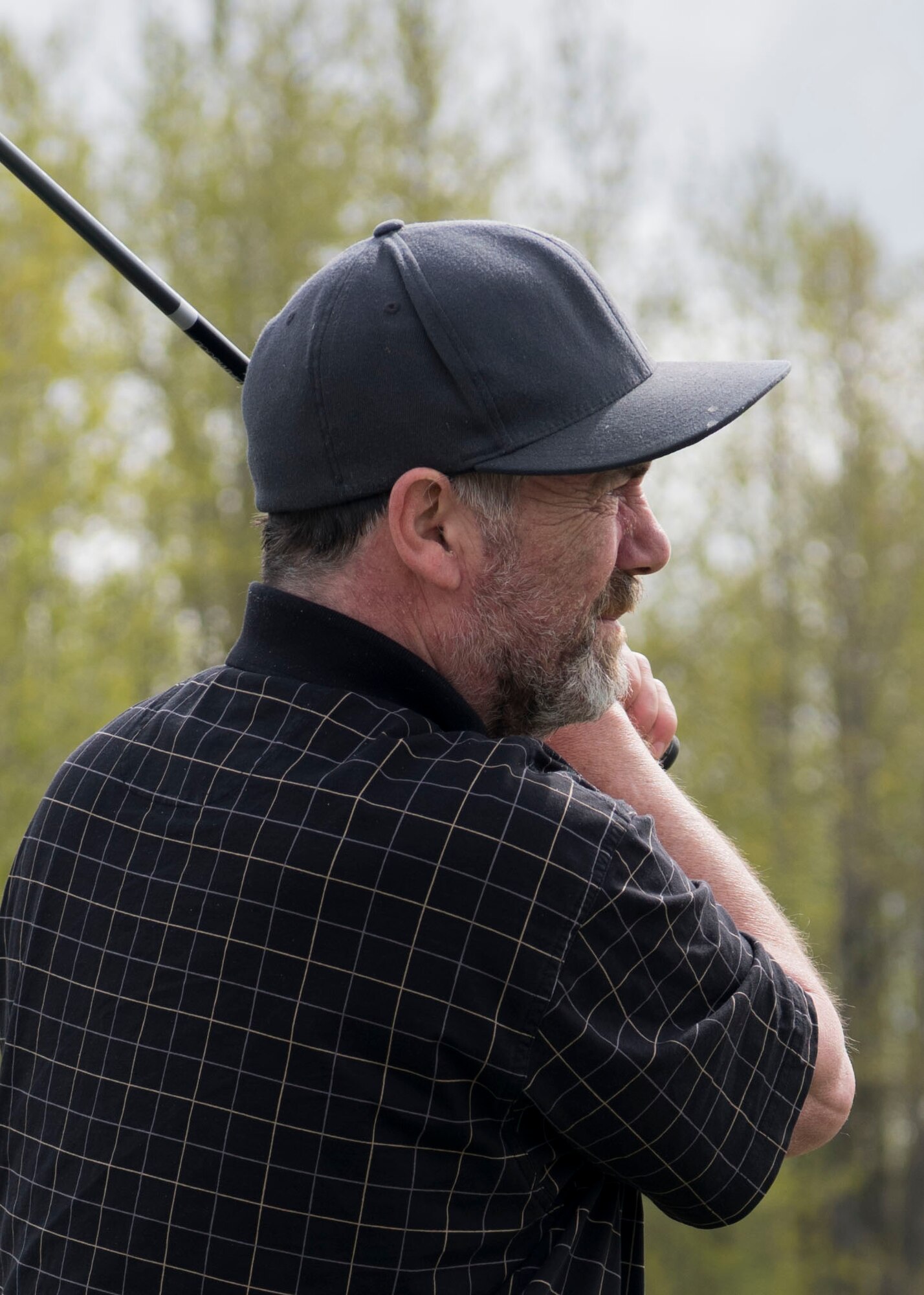 Kevin Hogan, watches where his golf ball lands as he works on compression at Moose Run Golf Course driving range at Joint Base Elmendorf-Richardson, Alaska, May 21, 2018. Hogan has been playing golf for more than 15 years and has played at Moose Run Golf Course since.