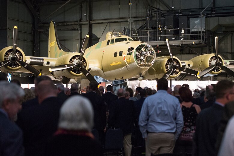 Crowds gather around the B-17F Memphis Belle to get a better look at the conclusion of its unveiling ceremony at the Memphis Belle exhibit inside the National Museum of the U.S. Air Force, Wright-Patterson Air Force Base, May 16. The Memphis Belle is the most famous Flying Fortress, having been the first able to return to the United States following 25 combat missions over occupied Europe during World War II. (U.S. Air Force photo/Wesley Farnsworth)