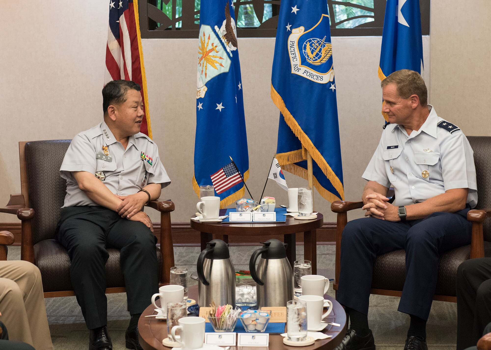Republic of Korea Army Gen. Byung Joo Kim, Combined Forces Command deputy commander, talks with U.S. Air Force Maj. Gen. Russ Mack, Pacific Air Forces deputy commander, during an office call at Joint Base Pearl Harbor-Hickam, Hawaii, May 21, 2018.