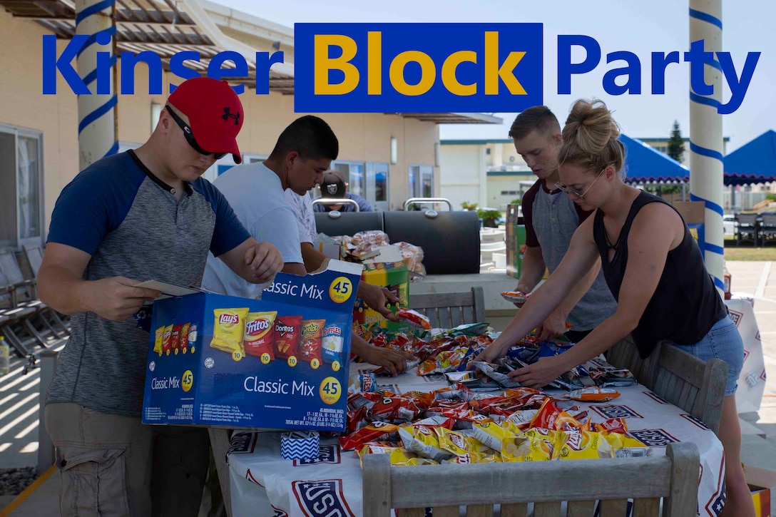 United Service Organizations volunteers set up food for the Kinser Block Party May 25, 2018, at the USO, Camp Kinser, Okinawa, Japan. The Kinser Block Party was directed by U.S. Marine Corps Col. Scott R. Johnson, the camp commander for Camp Kinser, as a way for service members and their families to enjoy a day of fun and camaraderie before embarking on the Memorial Day weekend. During the five-hour event, attendees enjoyed free food, games, live music and a dunk tank. (U.S. Marine Corps photo by Pfc. Terry Wong)
