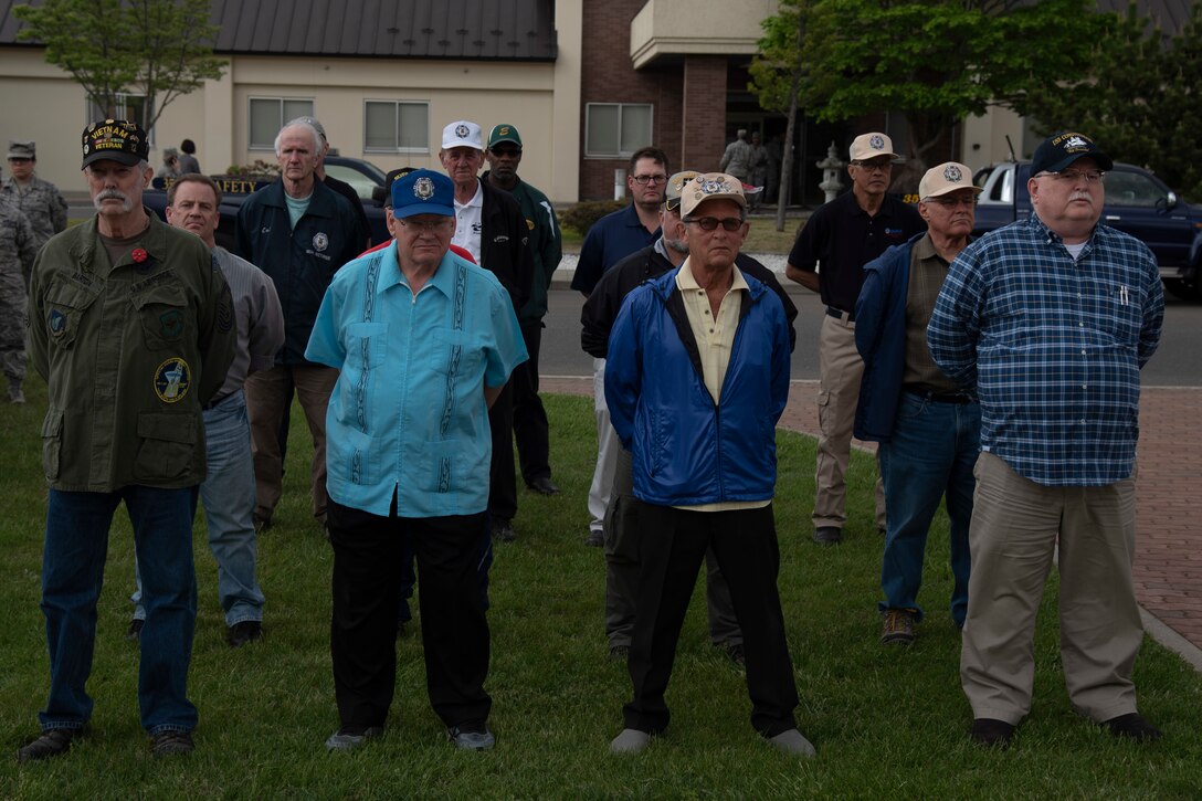Veterans stand in formation during a Memorial Day ceremony at Misawa Air Base, Japan, May 25, 2018. Memorial Day ceremonies, often incorporate U.S. Air Force personnel, Japan Air Self-Defense Force members and members of veteran organizations. (U.S. Air Force photo by Airman 1st Class Collette Brooks)