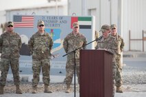 Air Force Master Sgt. Sandra Wellman, 380th Inspector General Inspections superintendent, speaks as the master of ceremonies a Memorial Day retreat ceremony on Al Dhafra Air Base, May 28, 2018. The ceremony honored all fallen service members with a flag retirement ceremony and words from leadership. (U.S. Air Force photo by Staff Sgt. Erica Rodriguez)