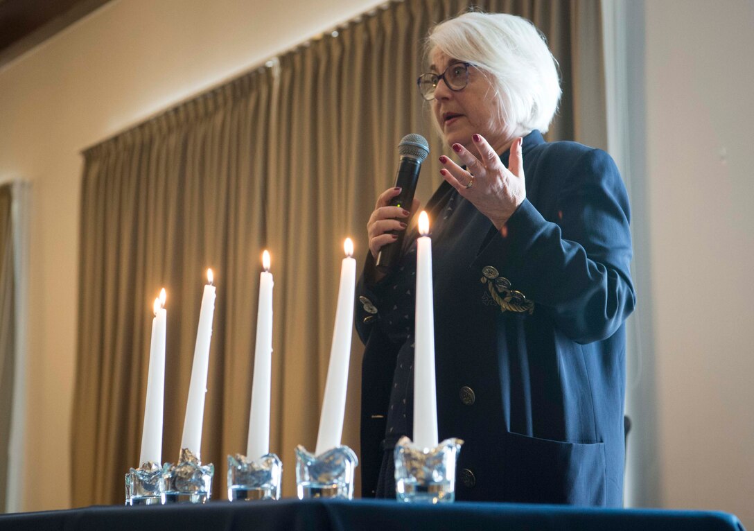 Joan Salter, Holocaust survivor, speaks at the 86th Airlift Wing’s Holocaust Remembrance as an honored guest on Ramstein Air Base, Germany, May 24, 2018. Salter was three months old when Germany invaded her country of residence, Belgium. The 86th AW Holocaust Remembrance honors all who were persecuted in the Holocaust as well as anyone affected by the tragedy, including rescuers and U.S. soldiers who risked their lives during the liberation.  (U.S. Air Force photo by Senior Airman Elizabeth Baker)